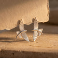 Sculptural Flying Fish Earrings, Silver Ocean Inspired Studs, Artistic Marine Life Jewelry, Nature Inspired Coastal Accessories