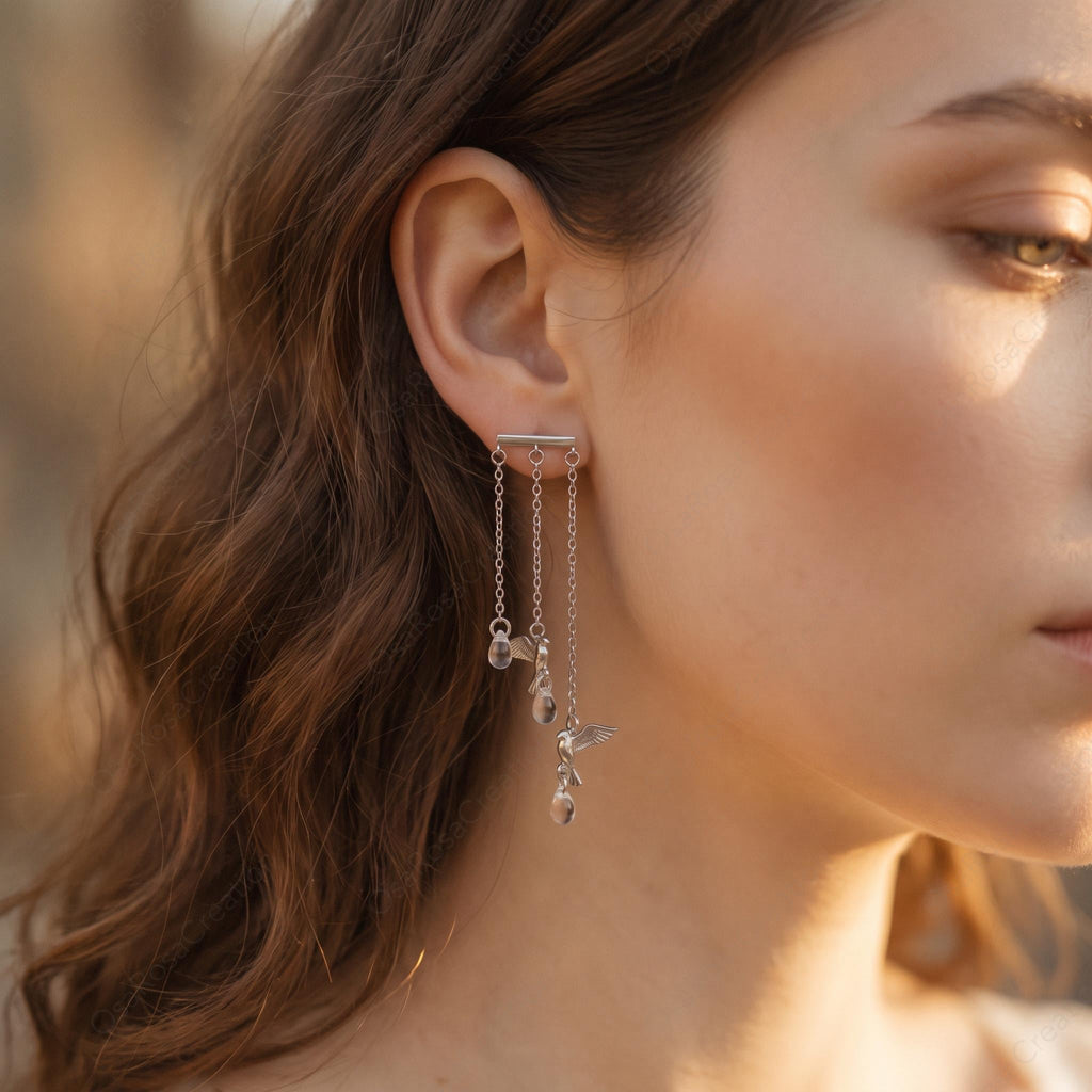 Kinetic Silver Bird Drop Earrings with Crystal Fringe – Nature Inspired Chandelier Jewelry